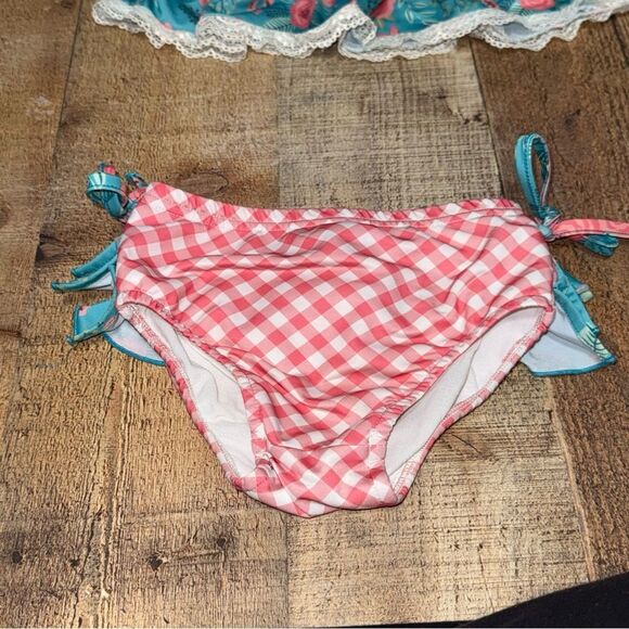 Oopsie daisy two
Piece swimsuit ruffle size 4 - Picture 3 of 10